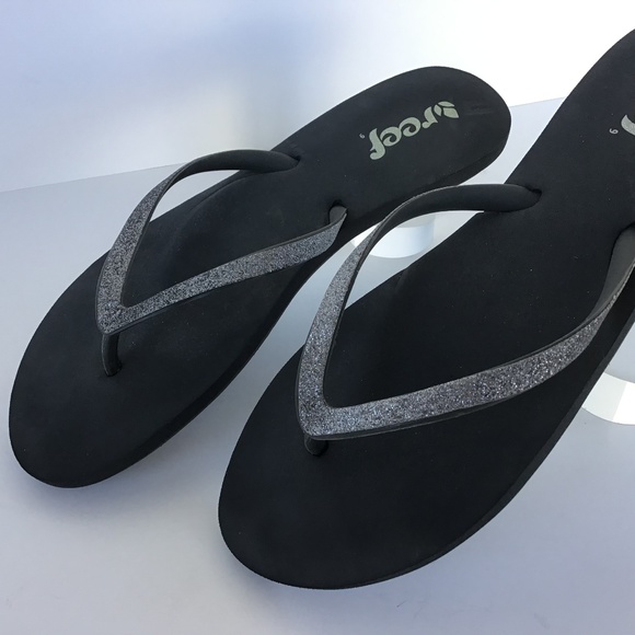 shiny black flip flops